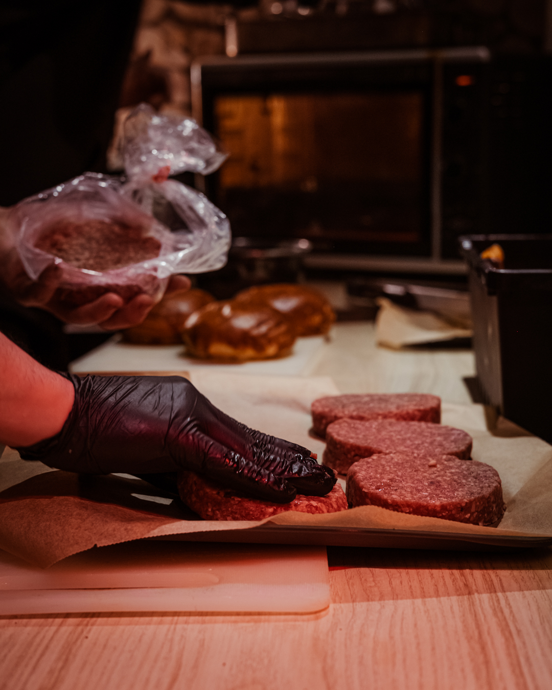 Preparing beef patties in the kitchen